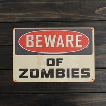 Металлическая табличка Beware of Zombies