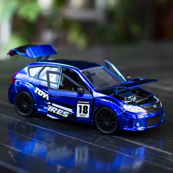 Масштабная модель Subaru Impreza WRX STI 2012 синяя JDM Tuners 1:24 изображение 4